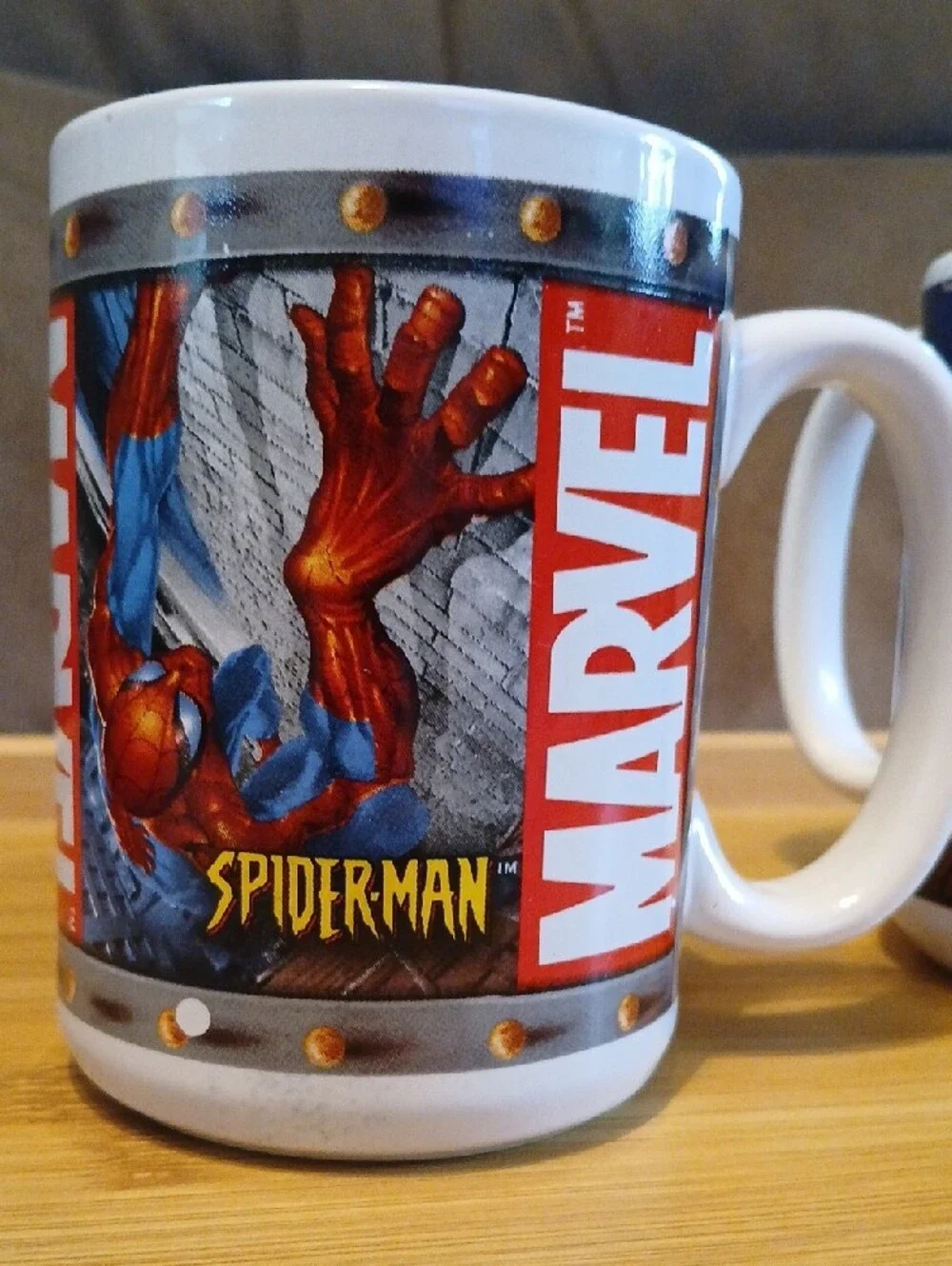Marvel Ceramic Mug Duo — White with Green and Red and Red and Gold Artwork